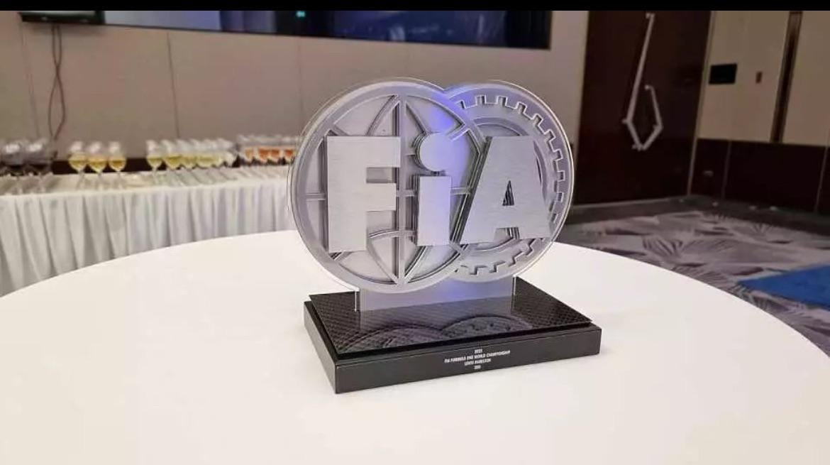 Hamilton Gives FIA Award To A Stranger