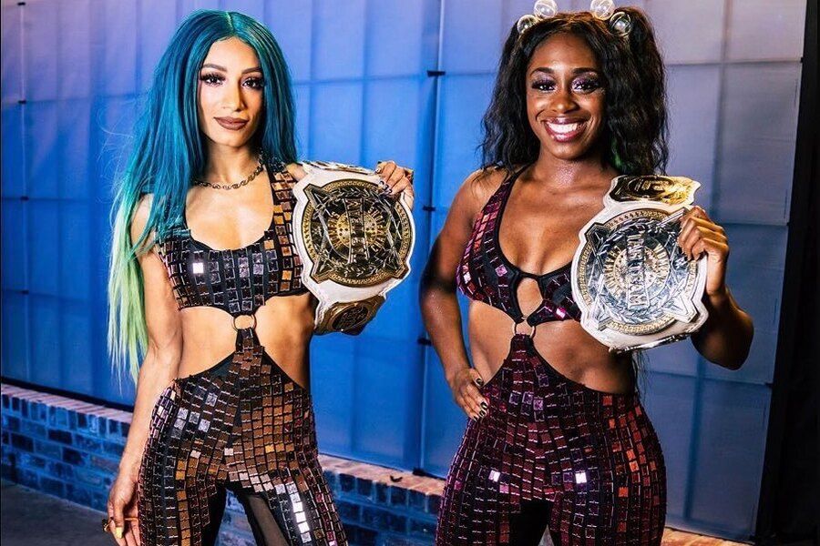WWE takes away Banks' and Naomi titles after walkout