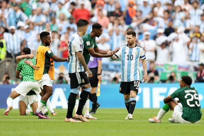 Saudi football player consoles Messi after Argentina's defeat at 2022 World Cup
