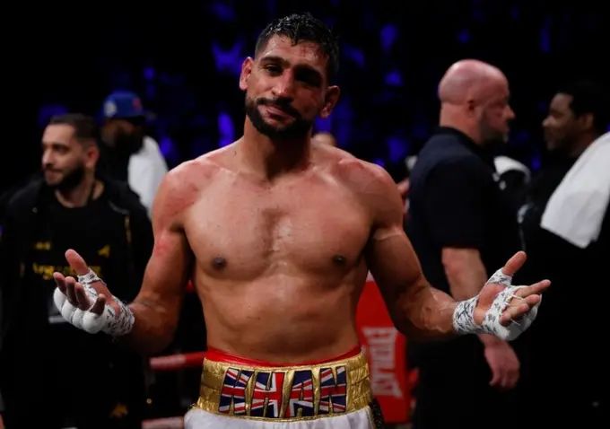Former world boxing champion Amir Khan gets two-year ban for doping