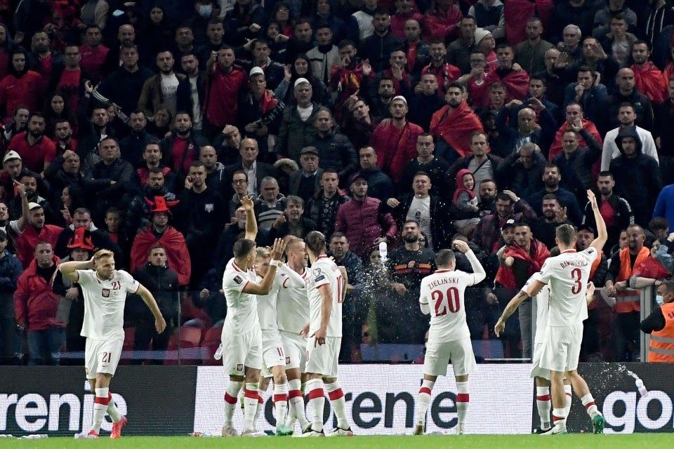 Poland-Albania game halted by fans throwing objects