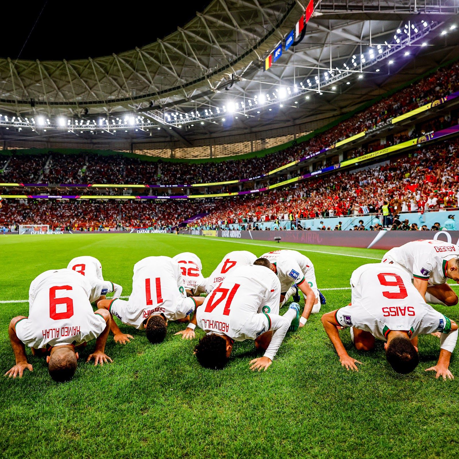 Image showing Morocco National team players celebrating their win vs Belgium in their previous Group F fixture.