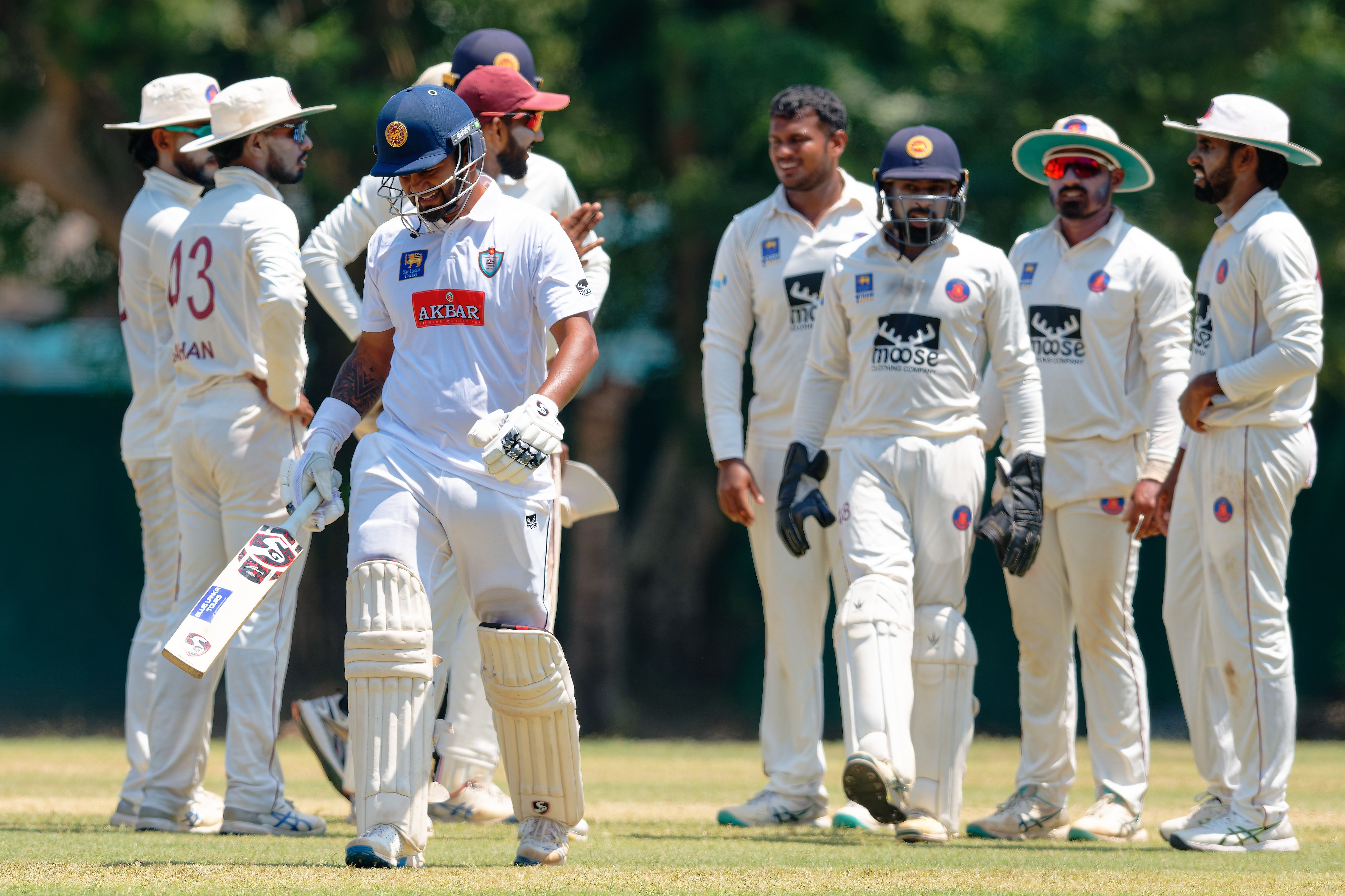 BIG BLOW: Karunaratne is seen walking back to the pavilion after being dismissed in SSC's last game against NCC where they needed an outright win but couldn't even get first innings points. BIG BLOW: Karunaratne is seen walking back to the pavilion after being dismissed in SSC's last game against NCC where they needed an outright win but couldn't even get first innings points.