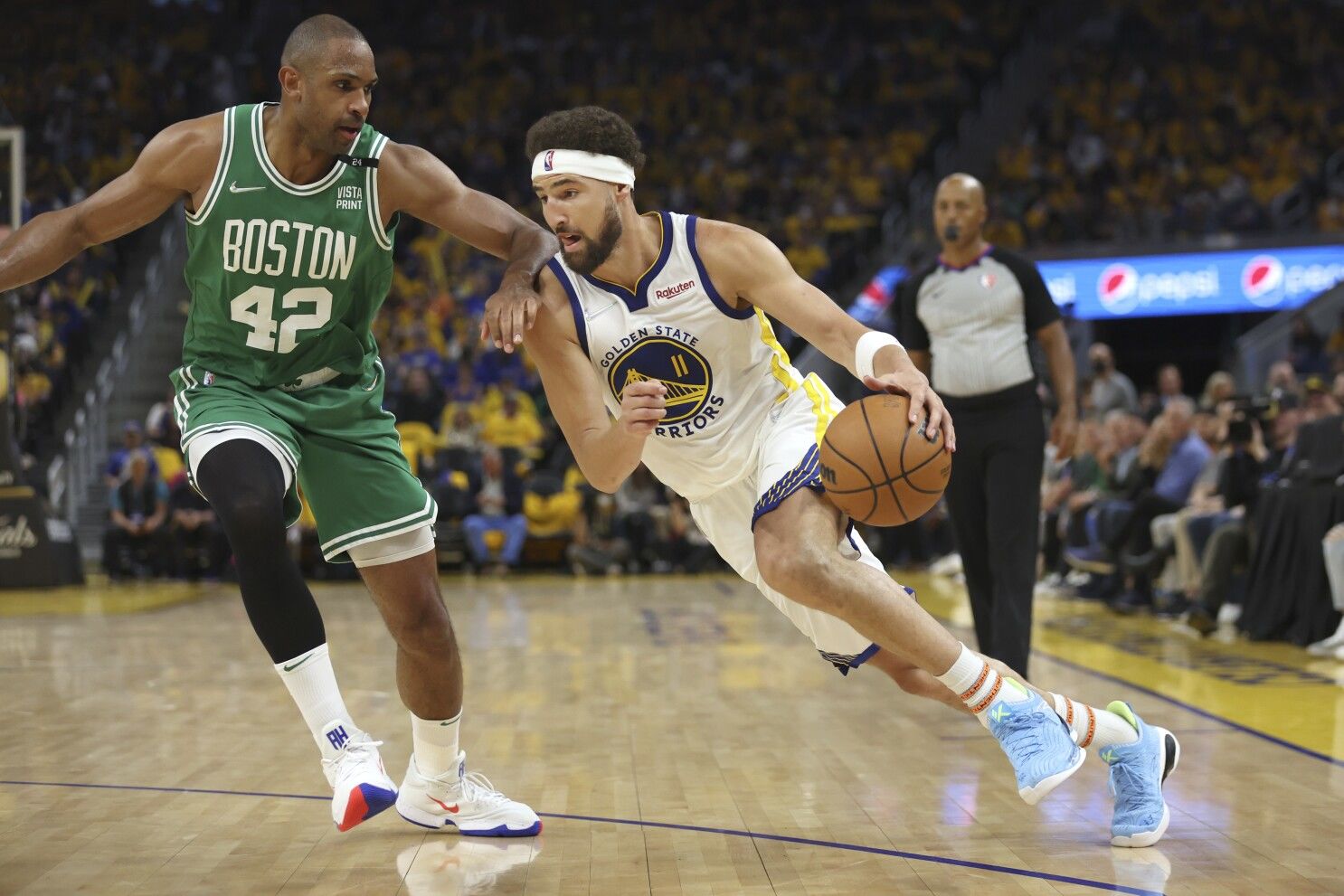 Klay Thompson looking to go past Al Horford (Golden State Warriors vs Boston Celtics)