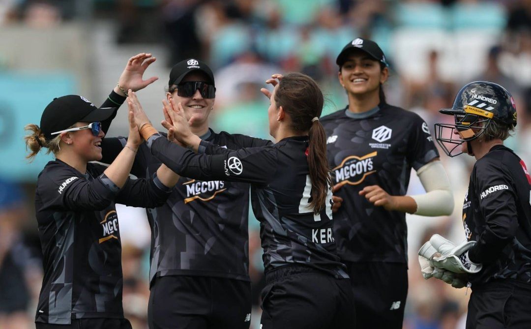 Manchester Originals Women players celebrate the fall of a wicket during their win against Oval Invincibles. @ The Hundred/X Manchester Originals Women players celebrate the fall of a wicket during their win against Oval Invincibles. @ The Hundred/X
