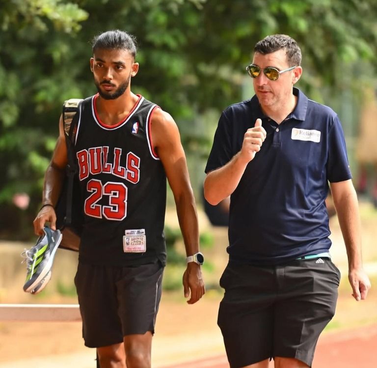 Tejas Shirse with his British coach James Hillier.
