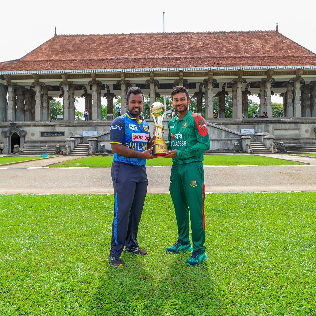 Sri Lanka captain Charith Asalanka and Bangladesh's Mehidy Hasan Miraz pose with the trophy ahead of the start of the ODI series. @ SLC Sri Lanka captain Charith Asalanka and Bangladesh's Mehidy Hasan Miraz pose with the trophy ahead of the start of the ODI series. @ SLC