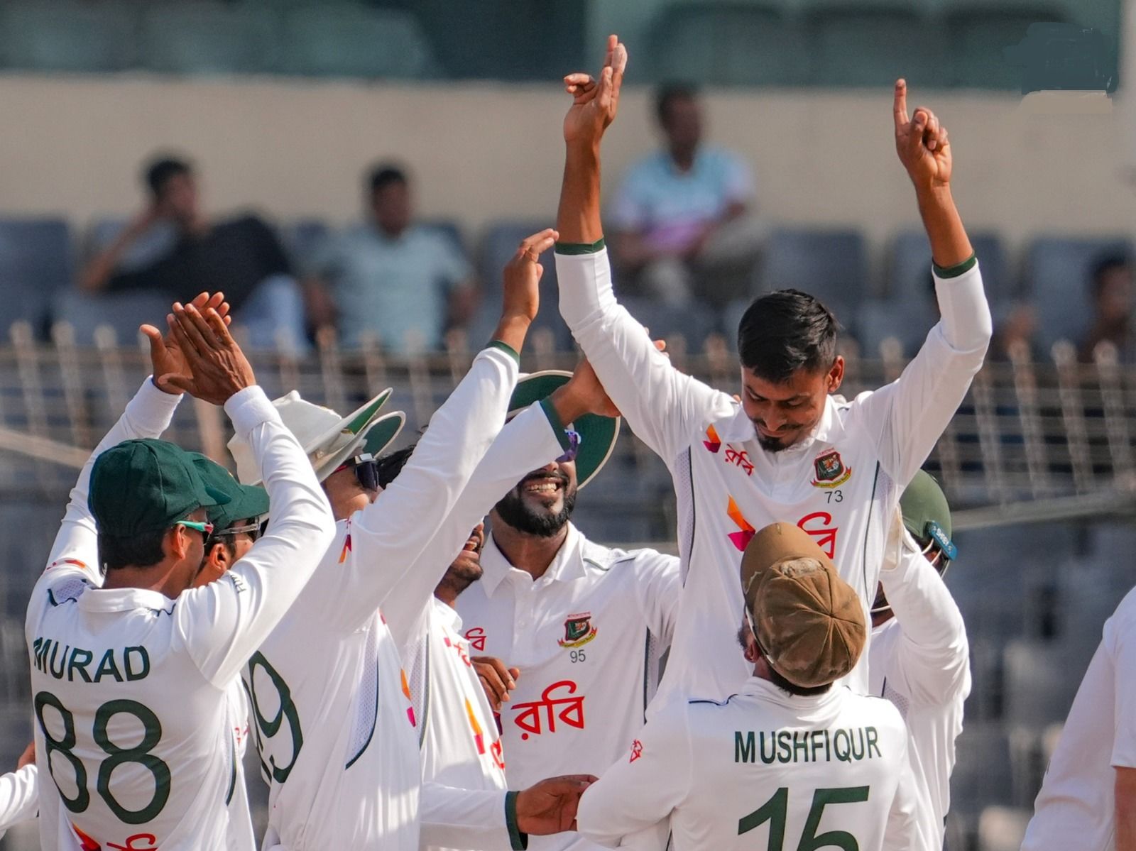Bangladesh players celebrate the fall of a wicket on the third day of the second Test against Ireland in Mirpur, near Dhaka. @BCBTigers/X