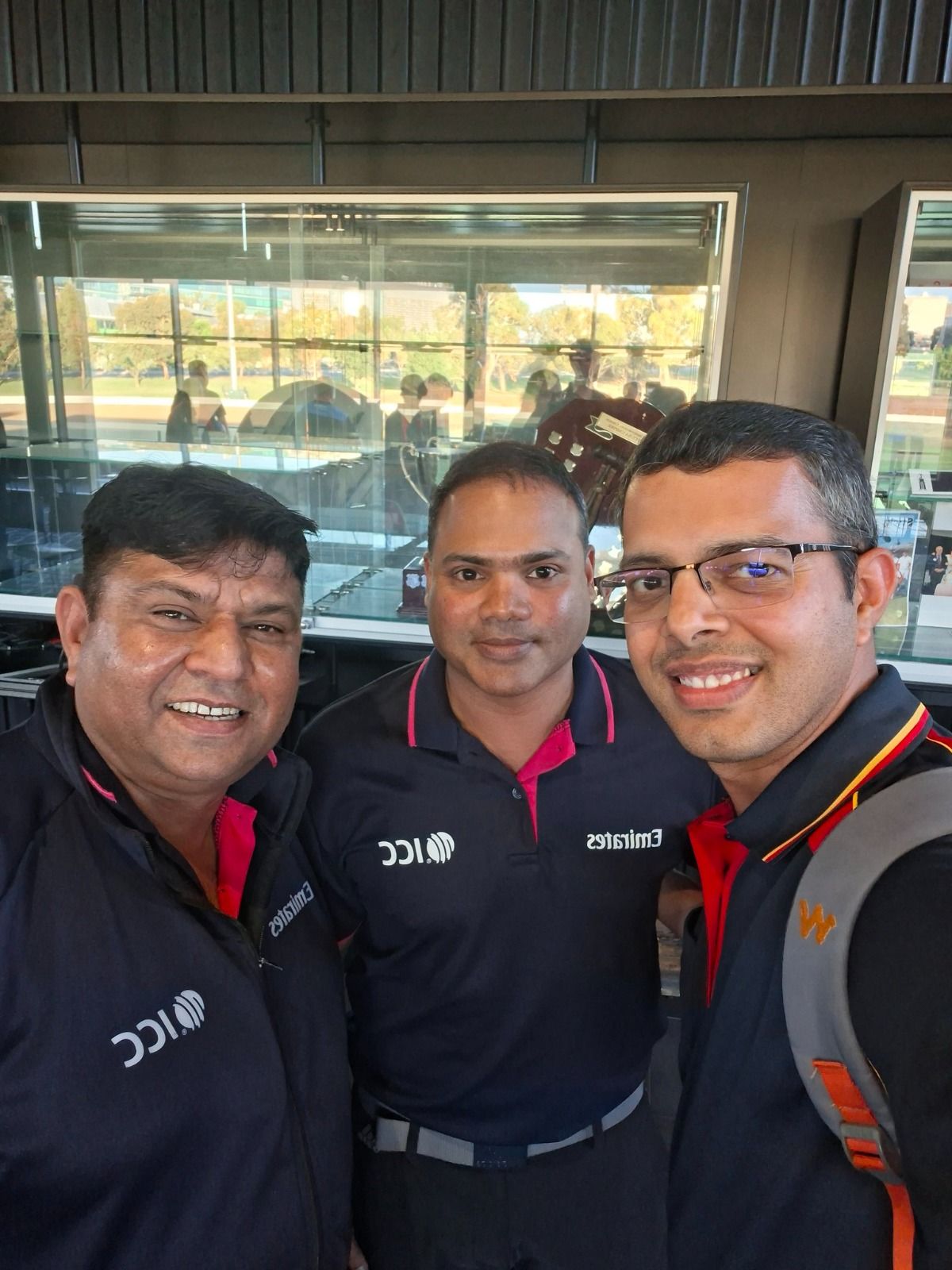 (L) Umpires Ahsan Raza of Pakistan, Nitin Menon Pose with a fan. @X (L) Umpires Ahsan Raza of Pakistan, Nitin Menon Pose with a fan. @X