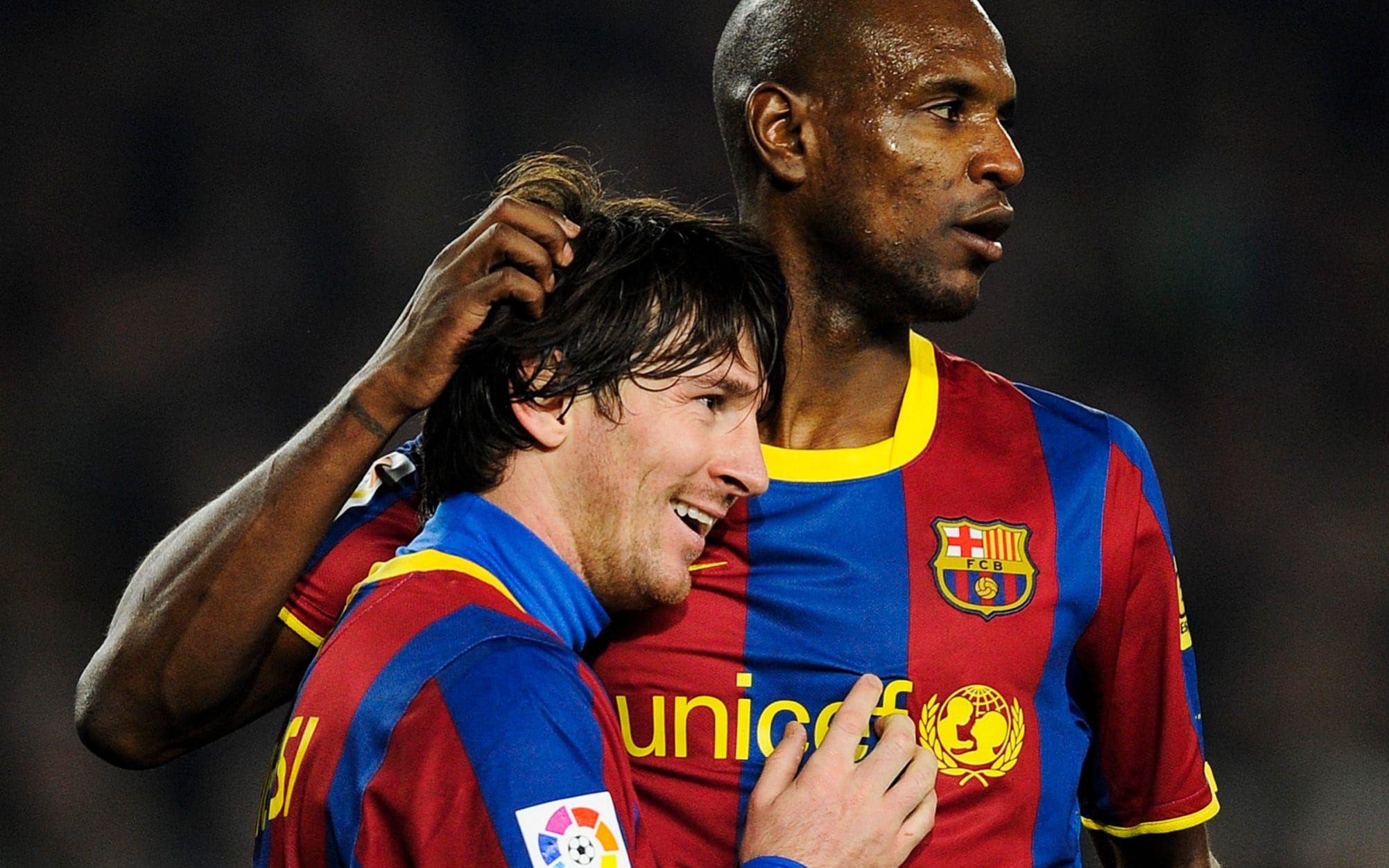 Eric Abidal y Messi