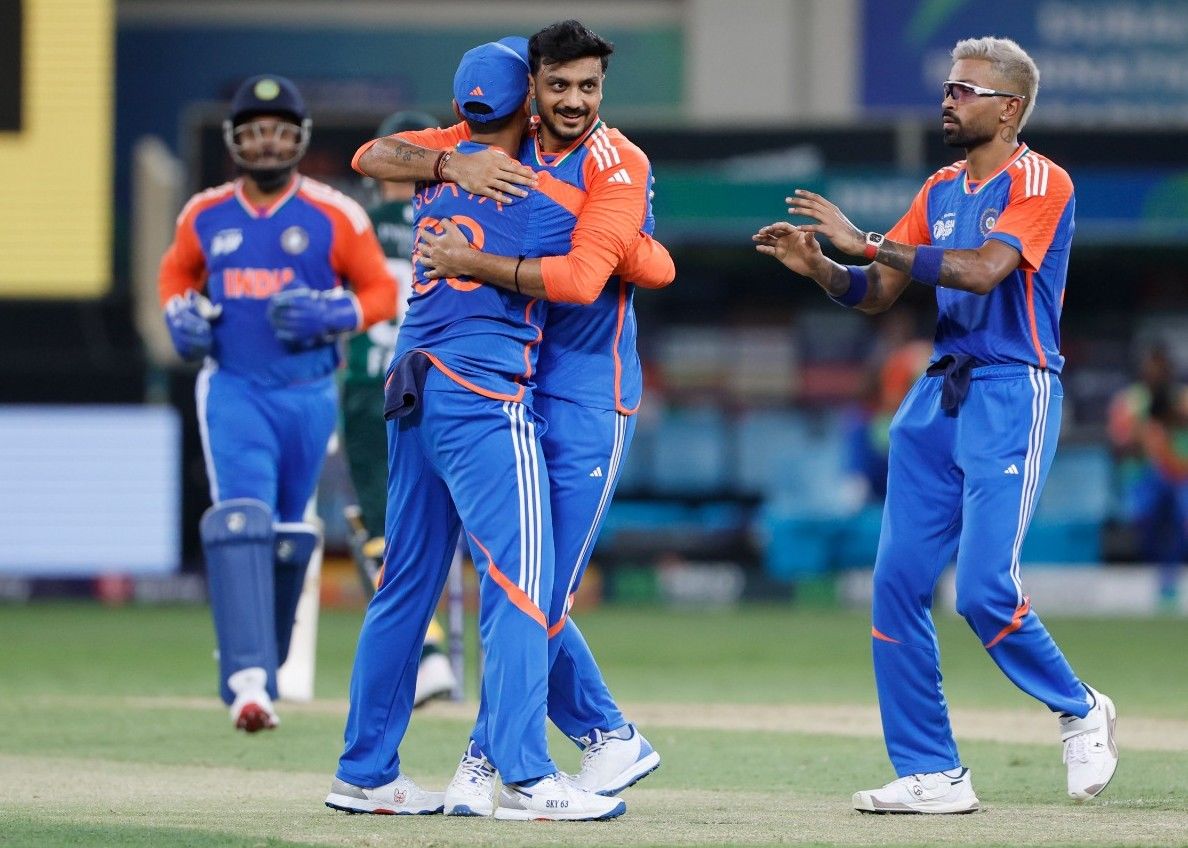 JUBILANT: India players celebrate a wicket in their last match against Sri Lanka. @ACC