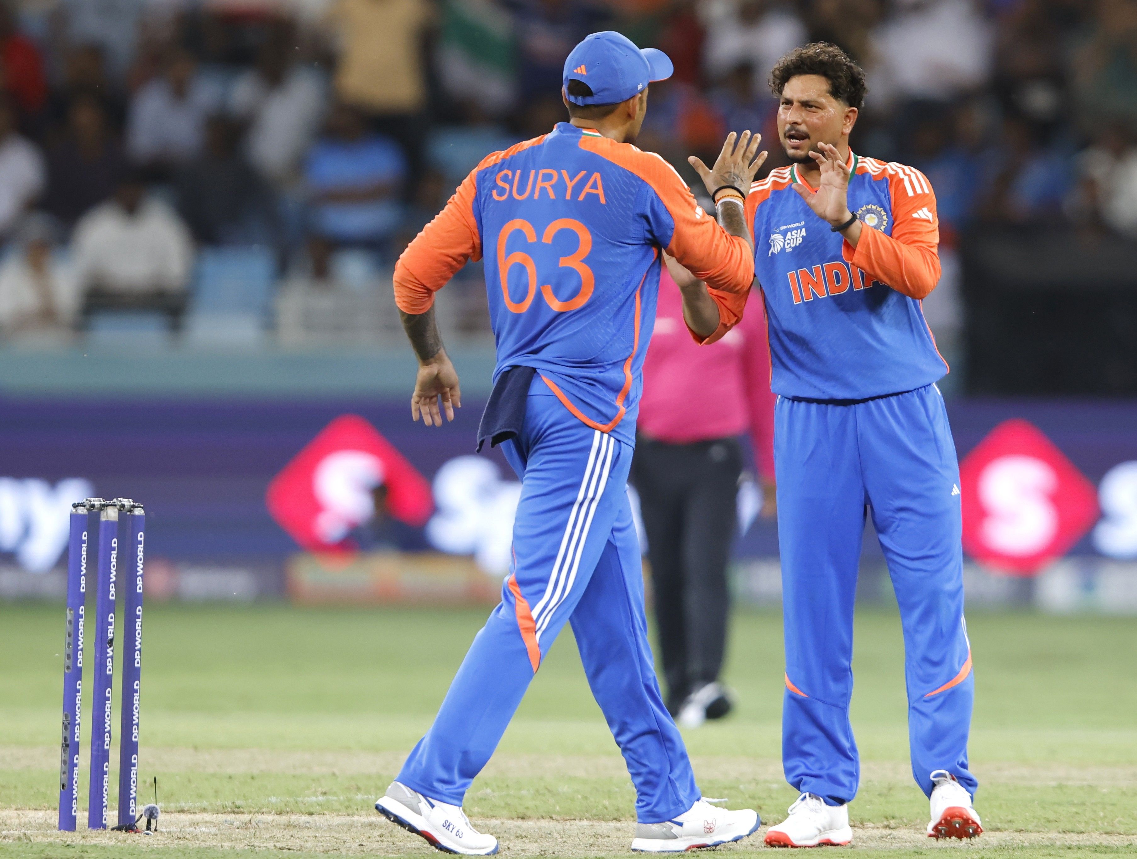 MAKING A MARK: Kuldeep Yadav celebrates a wicket with skipper Suryakumar Yadav during the Asia Cup match against UAE in Dubai. @ACC