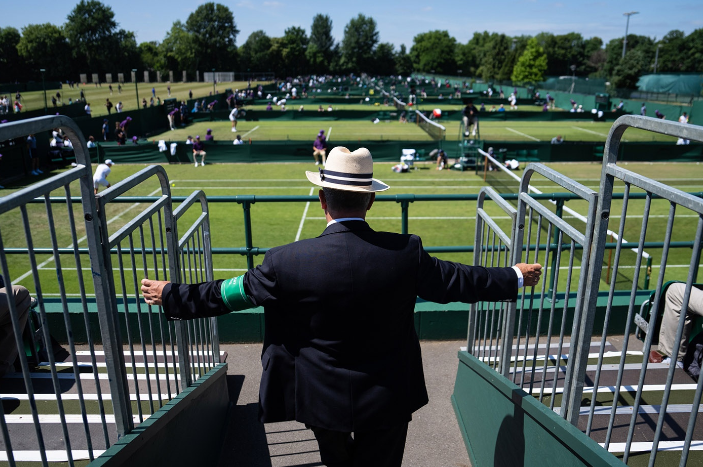 A fan watching 2022 Wimbledon qualifying Matches