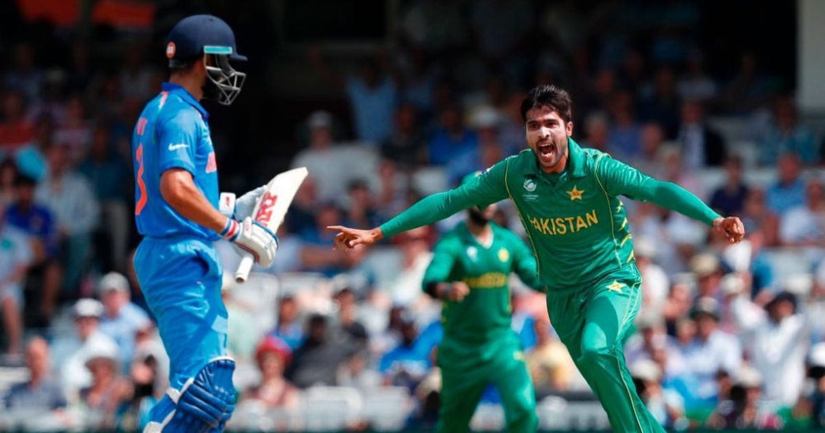 Mohammad Amir celebrates the wicket of Virat Kohli