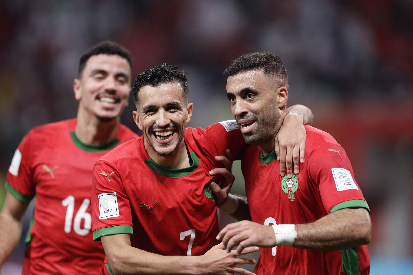 (R) Morocco forward Abderrazzaq Allah celebrates after scoring his team's third goal with Mohamed Boulacsout and Achraf Al Mahdioui at the Khalifa International Stadium: @AFC (R) Morocco forward Abderrazzaq Allah celebrates after scoring his team's third goal with Mohamed Boulacsout and Achraf Al Mahdioui at the Khalifa International Stadium: @AFC
