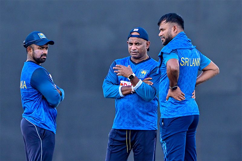 Captain Charith Asalanka with coach Sanath Jayasurya.