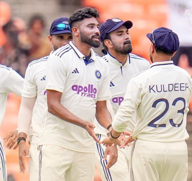 IN FINE FORM; Mohammed Siraj celebrates fall of a wicket with teammates on the opening day of the first Test against West Indies in Ahmedabad. @ BCCI/X