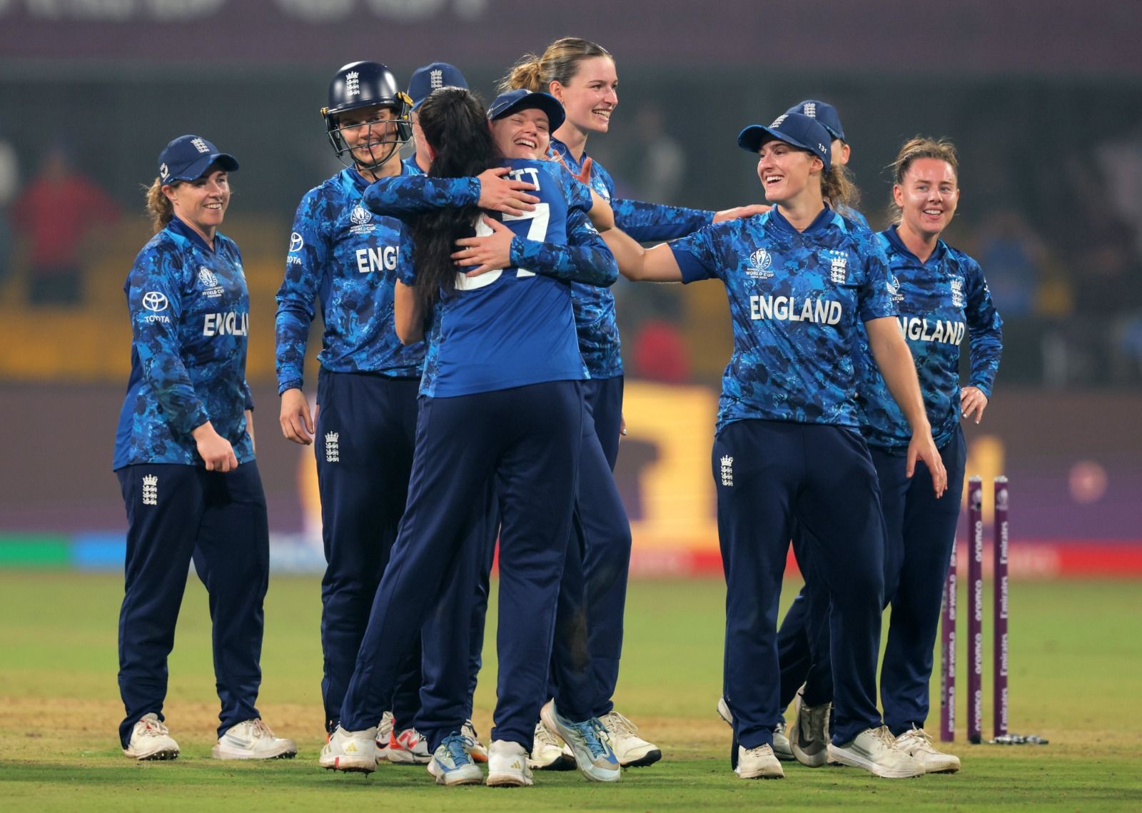 JUBILANT: England players celebrates a wicket. @ICC