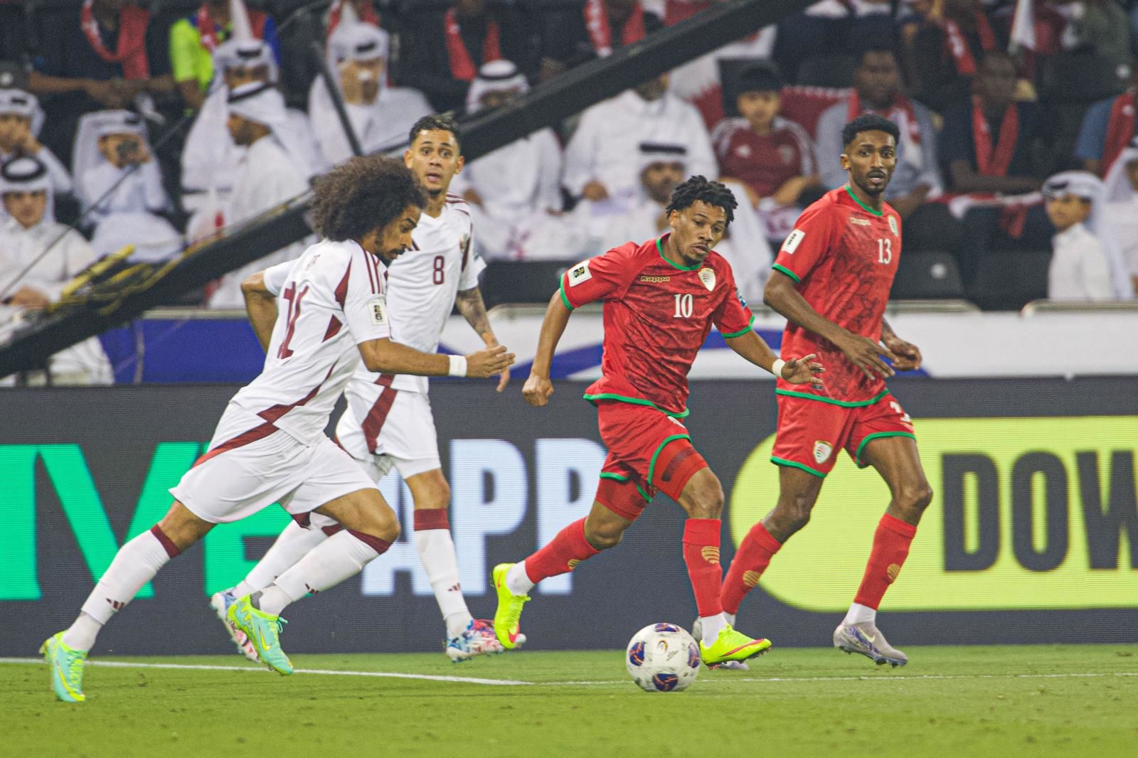 Action from the Qatar vs Oman match. @QNA Action from the Qatar vs Oman match. @QNA