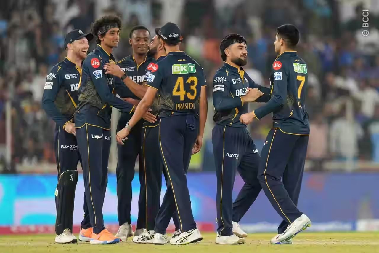 Gujarat Titans in a huddle during a match @BCCI