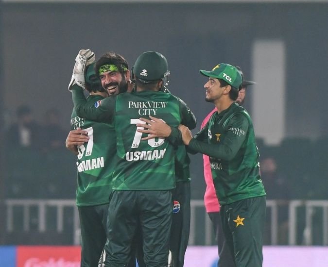 JUBILANT: Pakistan players celebrate the fall of a wicket against Zimbabwe in the fourth match of the Tri-Nation Series in Rawalpindi. @PCB JUBILANT: Pakistan players celebrate the fall of a wicket against Zimbabwe in the fourth match of the Tri-Nation Series in Rawalpindi. @PCB