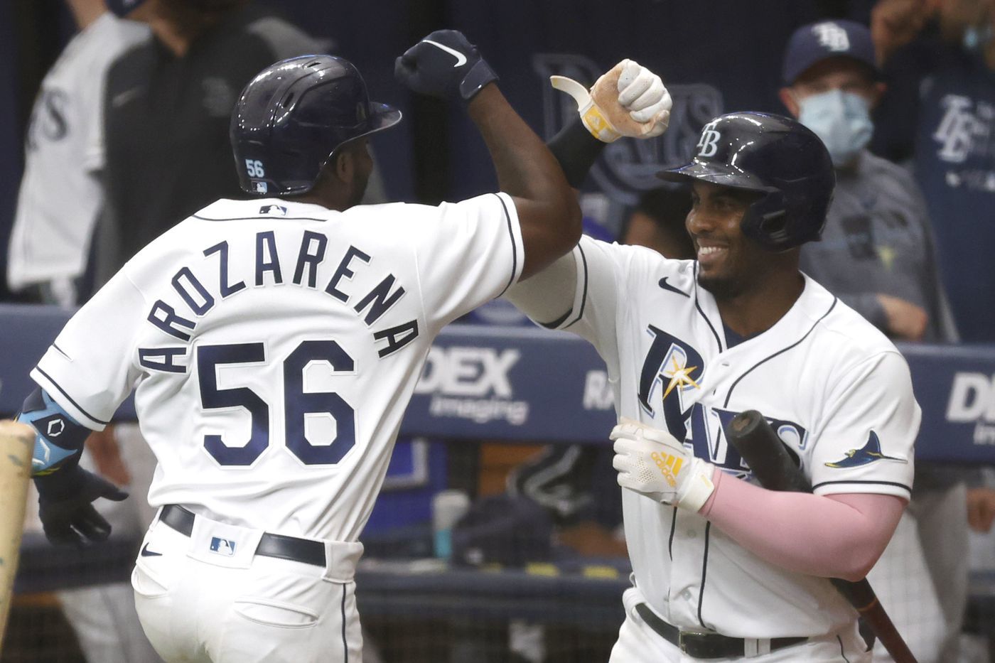 Arozarena y Yandy Díaz