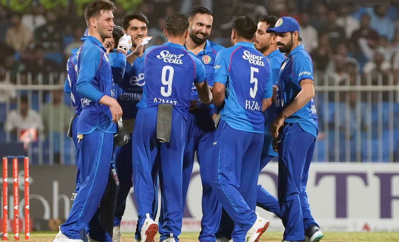 Afghanistan players celebrate a wicket. @ Afghanistan Cricket Board