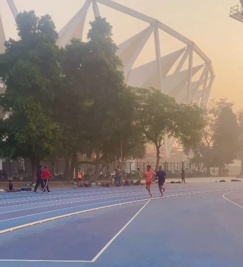 Athletes training at Jawaharlal Nehru Stadium in Delhi. Athletes training at Jawaharlal Nehru Stadium in Delhi.