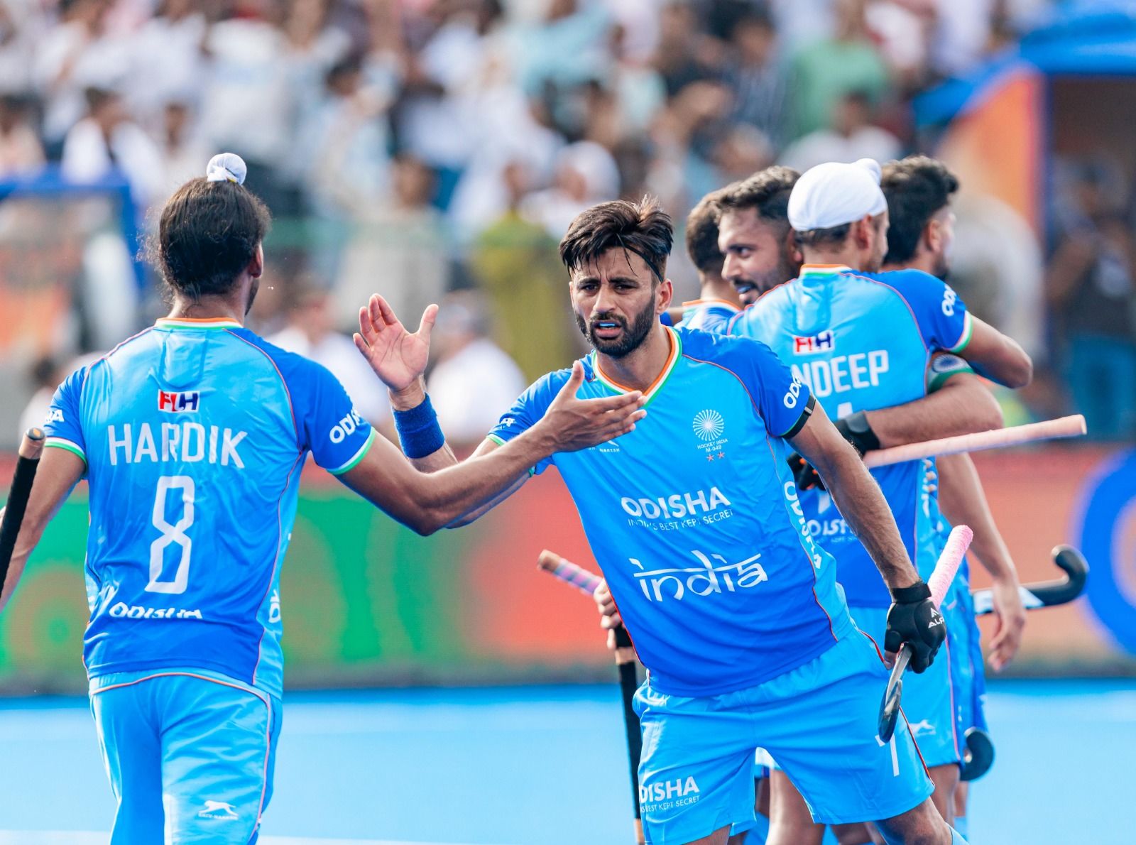 India players celebrate their win. @Hockey India